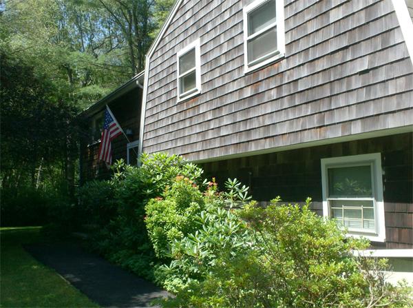 63 Allen Road Easton, MA 02356 - Photo 4 of 15 a front view of a house with a garden