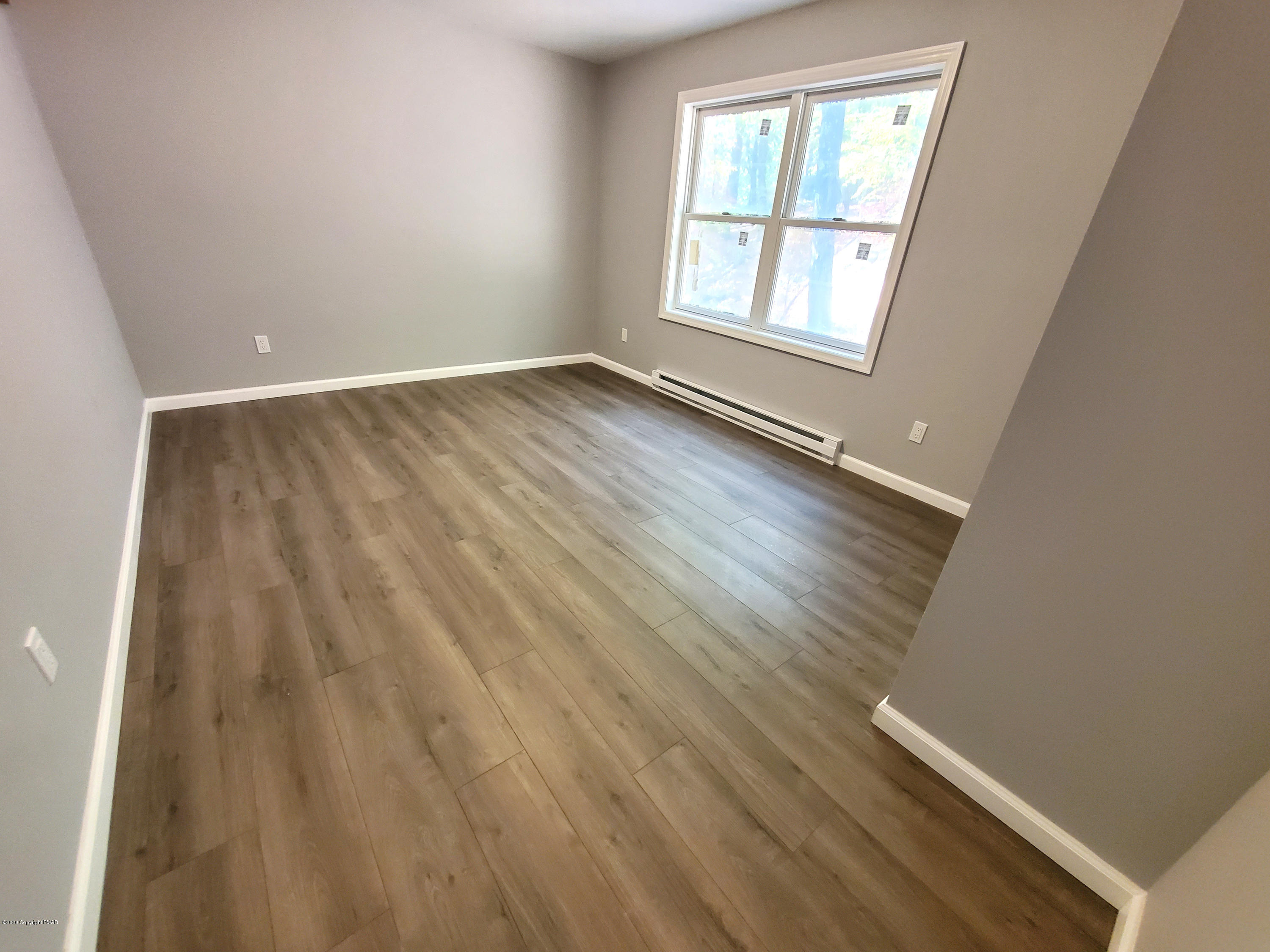 2273 Milford Road Bushkill, PA 18324 - Photo 14 of 23 wooden floor in an empty room with a window