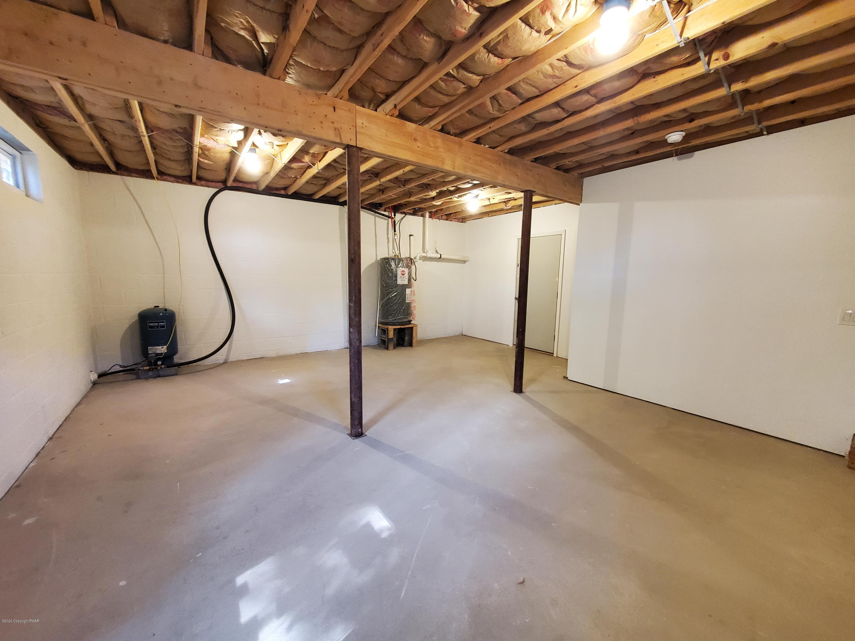2273 Milford Road Bushkill, PA 18324 - Photo 16 of 23 a view of a room with wooden walls