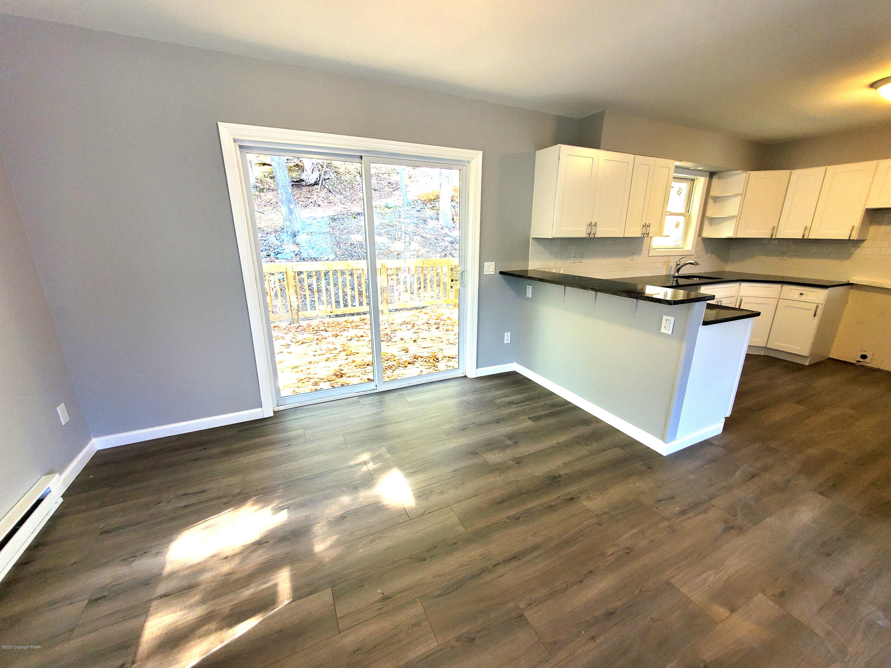 2273 Milford Road Bushkill, PA 18324 - Photo 3 of 23 a view of kitchen with granite countertop window and a sink