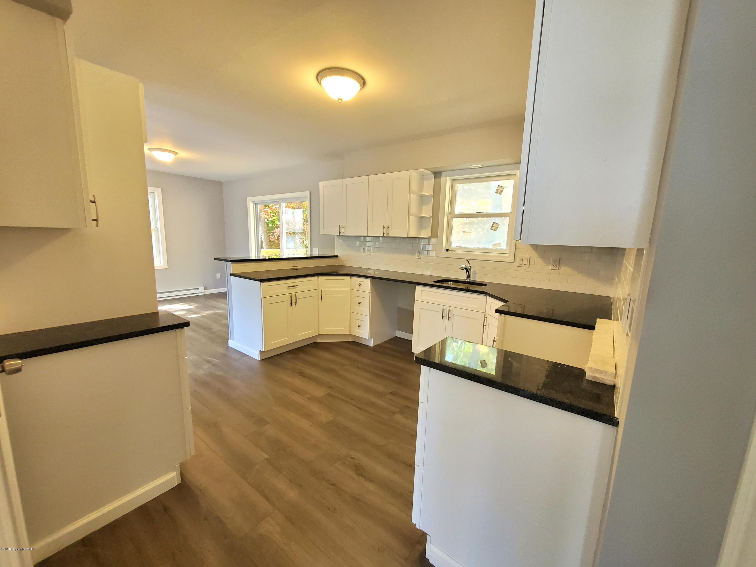 2273 Milford Road Bushkill, PA 18324 - Photo 5 of 23 a kitchen with stainless steel appliances granite countertop a sink stove and refrigerator