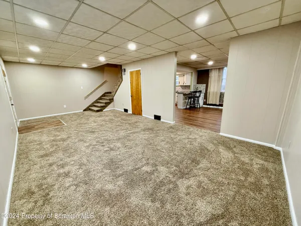 a view of a livingroom with a flat screen tv