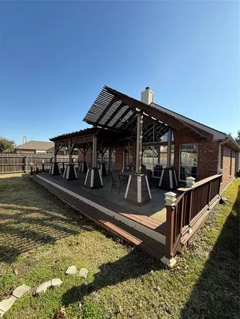 a view of swimming pool with an outdoor seating