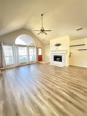 a view of livingroom and kitchen with hardwood floor