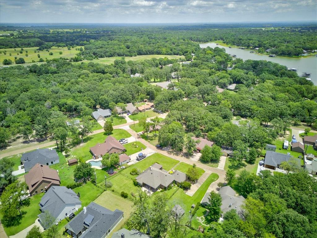 111 Trailwood Road Enchanted Oaks, TX 75156 - Photo 31 of 33 an aerial view of residential houses with outdoor space and trees