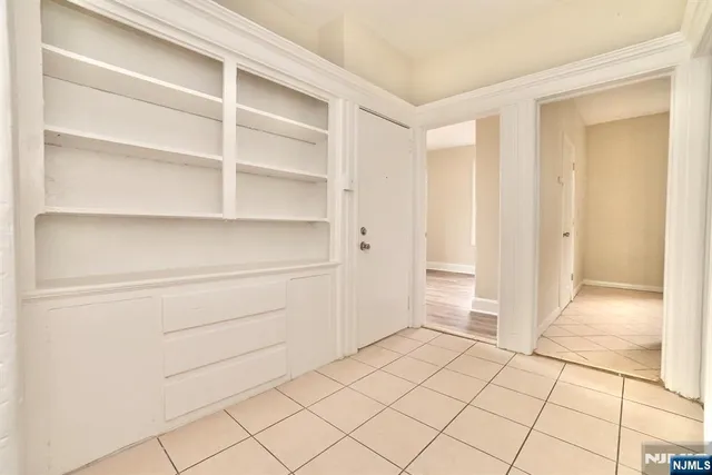 a view of an empty walk in closet