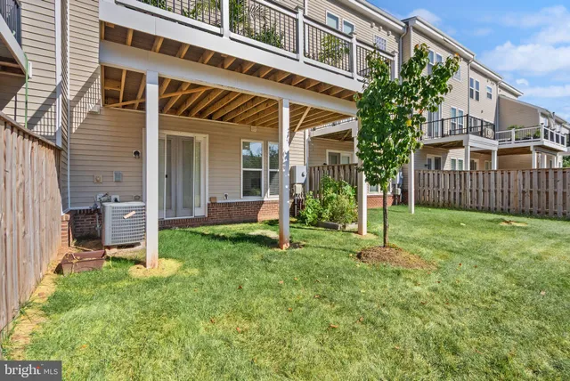a front view of a building with large windows
