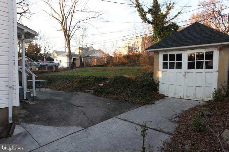 702 Murdock Road Baltimore, MD 21212 - Photo 3 of 25 a view of a house with backyard and trees