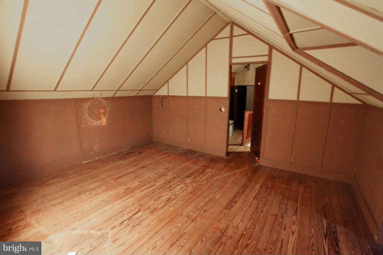 702 Murdock Road Baltimore, MD 21212 - Photo 24 of 25 a view of a room with wooden floor