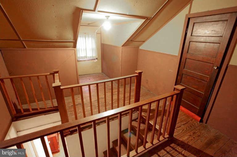 702 Murdock Road Baltimore, MD 21212 - Photo 25 of 25 a view of staircase with railing and stairs