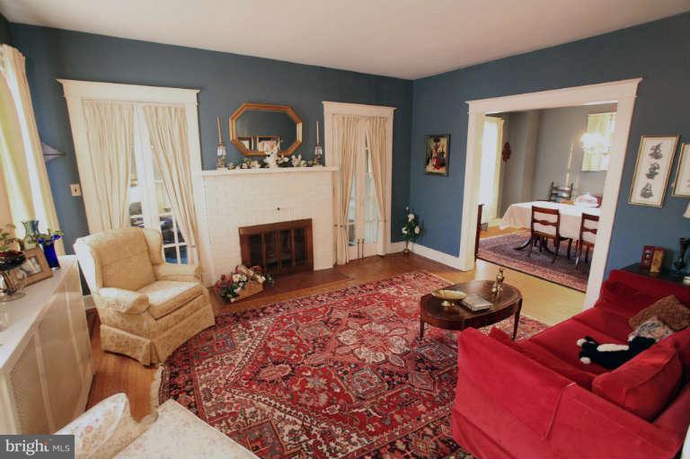 702 Murdock Road Baltimore, MD 21212 - Photo 5 of 25 a living room with furniture and a fireplace