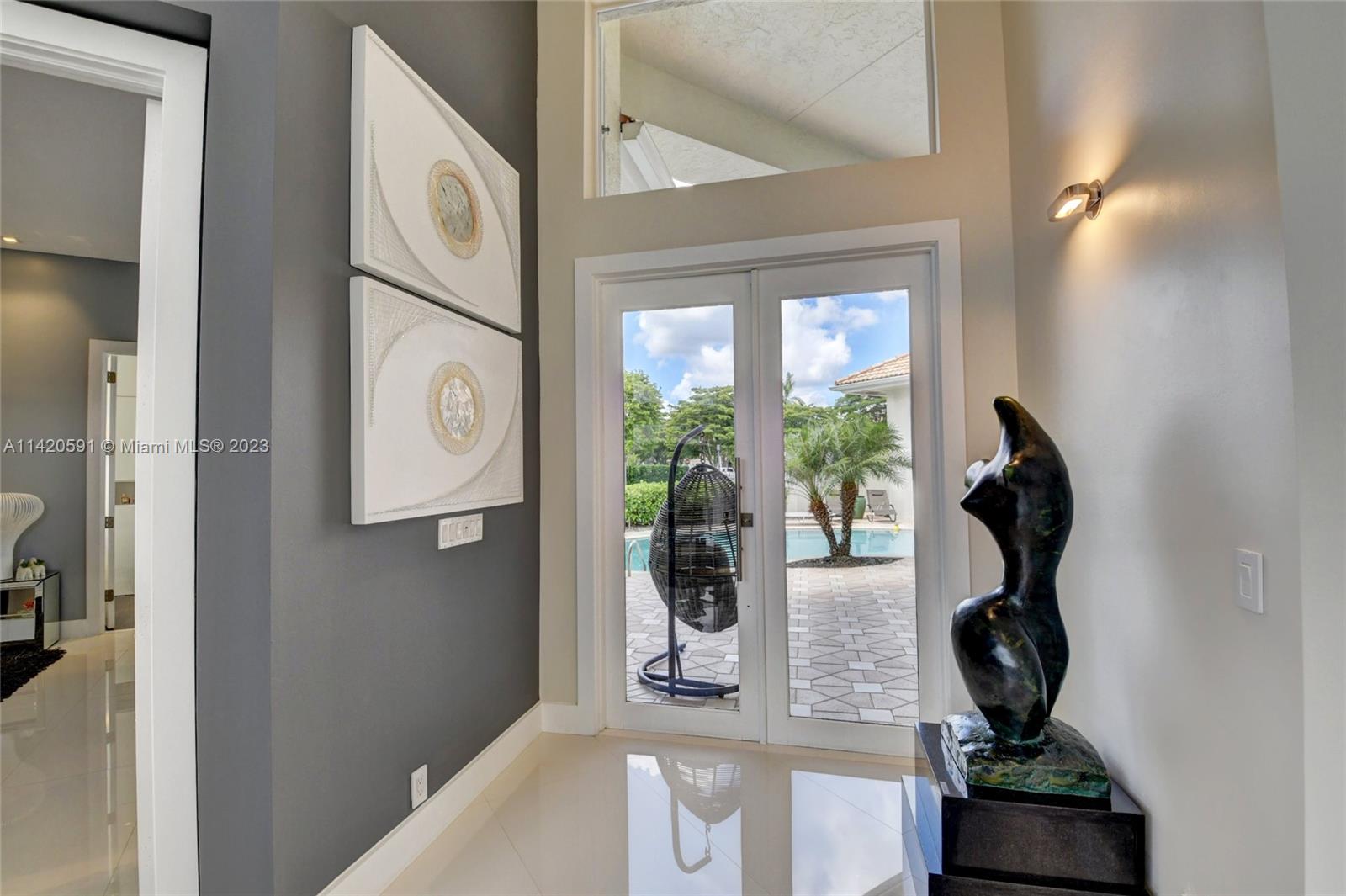 6398 Northwest 32nd Terrace Boca Raton, FL 33496 - Photo 15 of 45 a view of entryway