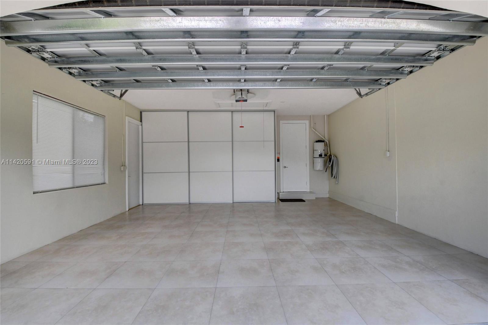 6398 Northwest 32nd Terrace Boca Raton, FL 33496 - Photo 36 of 45 a view of a room with racks