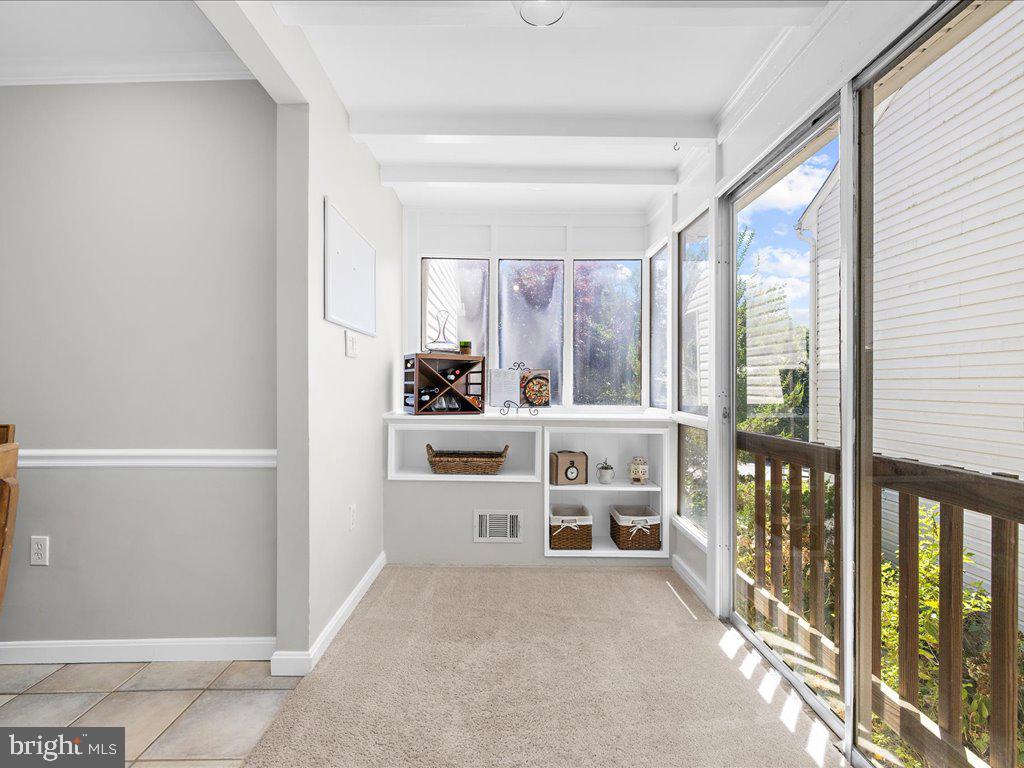 704 Roxboro Road Rockville, MD 20850 - Photo 11 of 43 Sunroom with built-in shelves