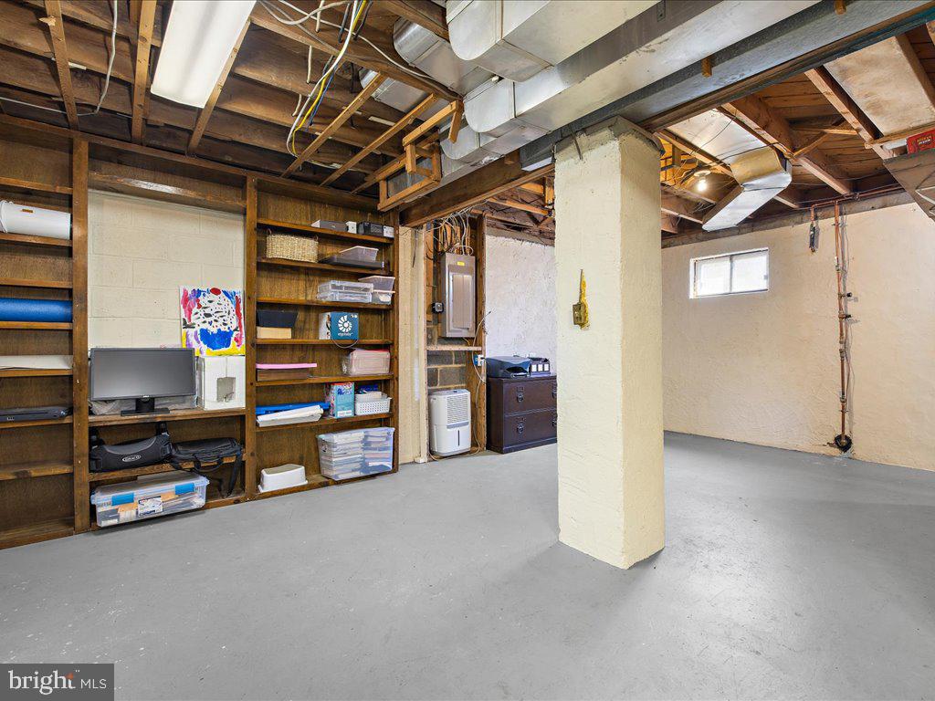 704 Roxboro Road Rockville, MD 20850 - Photo 26 of 43 Large Lower Level with Shelving