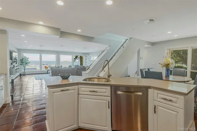 a view of a kitchen with a sink