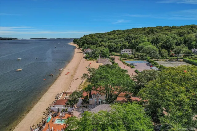 a view of a pathway both side of building with yard