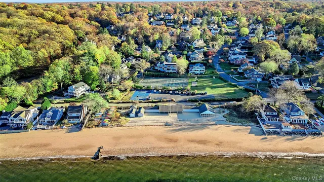 a view of swimming pool with outdoor seating