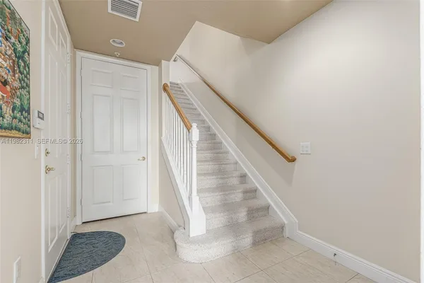 $419,000 | 12631 Southeast Old Cypress Drive, Unit 12631, Hobe Sound, FL 33455