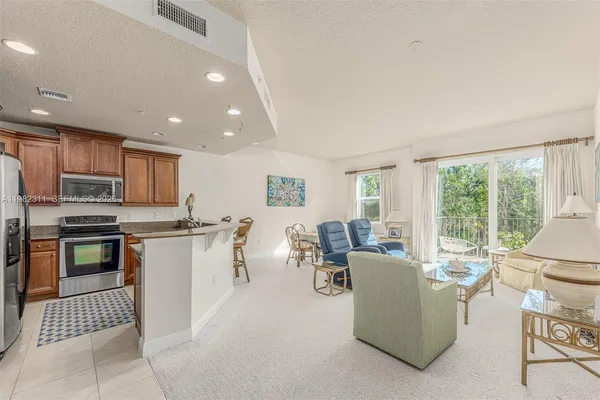 $419,000 | 12631 Southeast Old Cypress Drive, Unit 12631, Hobe Sound, FL 33455