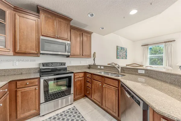 $419,000 | 12631 Southeast Old Cypress Drive, Unit 12631, Hobe Sound, FL 33455