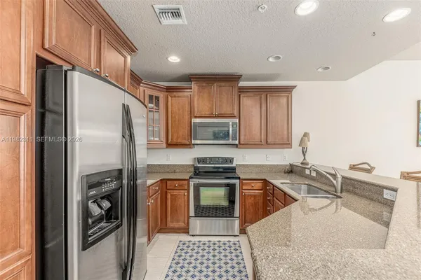 $419,000 | 12631 Southeast Old Cypress Drive, Unit 12631, Hobe Sound, FL 33455