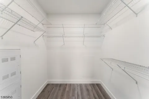 a view of a room with racks on the wall