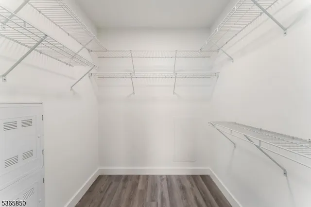 a view of a room with racks on the wall