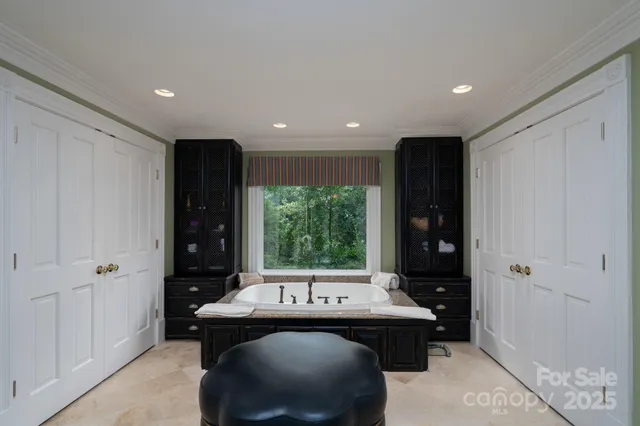 a view of an outdoor dining space with a table and chairs