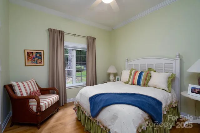 a bedroom with a bed and a couch