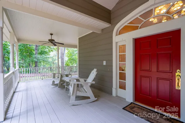 a dining room with furniture a rug and wooden floor