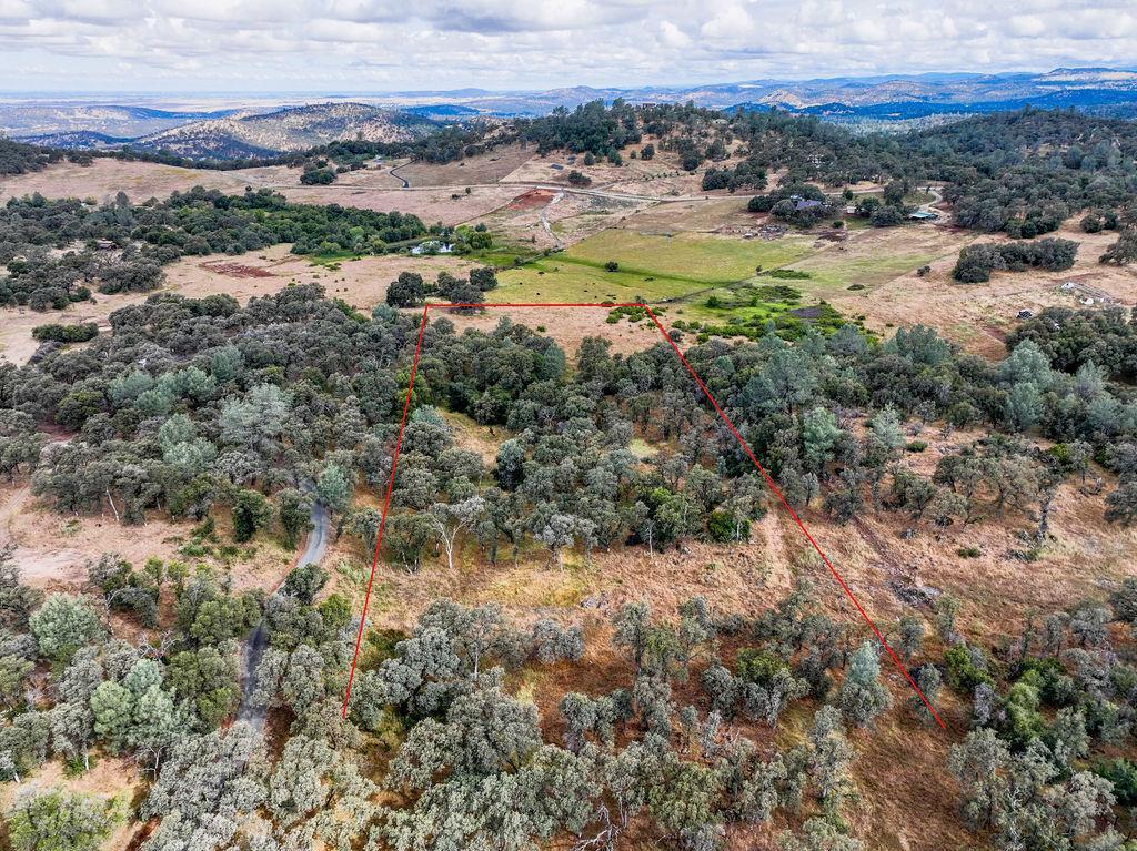 19838 Perimeter Road Grass Valley, CA 95949 - Photo 21 of 30 a view of a lake with mountains in the background