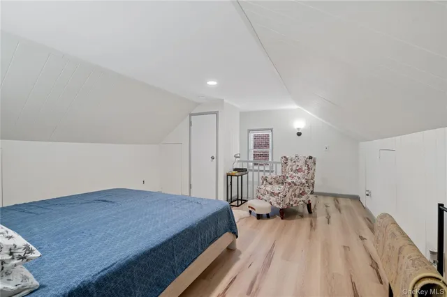 a view of a livingroom with furniture and wooden floor