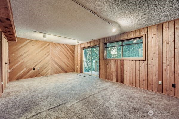 114 212th Street Southeast Bothell, WA 98021 - Photo 19 of 24 a view of an empty room with a window