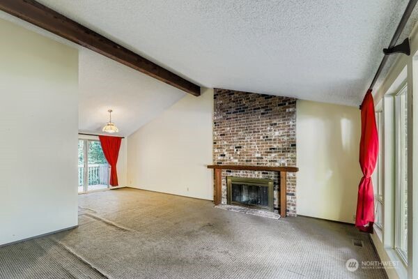 114 212th Street Southeast Bothell, WA 98021 - Photo 5 of 24 a view of a livingroom with a fireplace