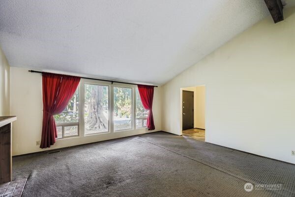 114 212th Street Southeast Bothell, WA 98021 - Photo 6 of 24 an empty room with windows