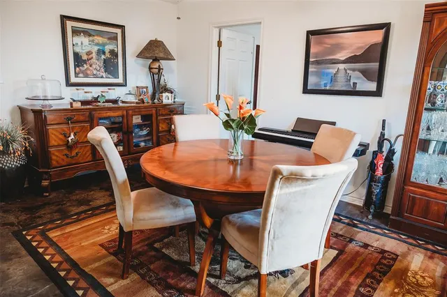 a view of a dining room with furniture