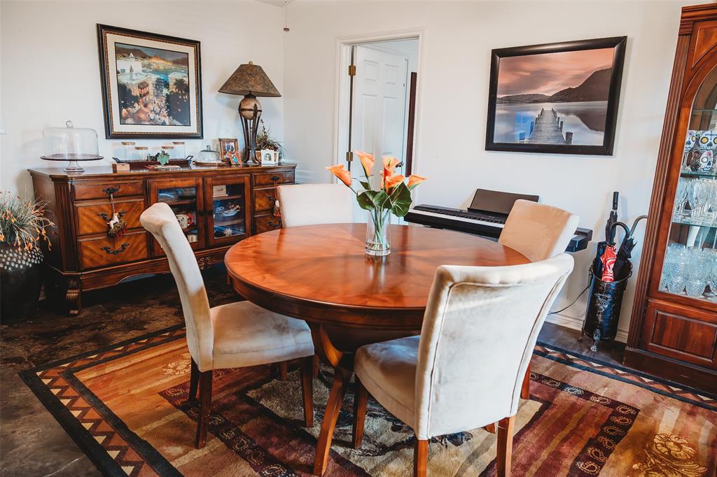 6078 East Line Road Whitewright, TX 75491 - Photo 13 of 32 Dining area with dark wood-style floors