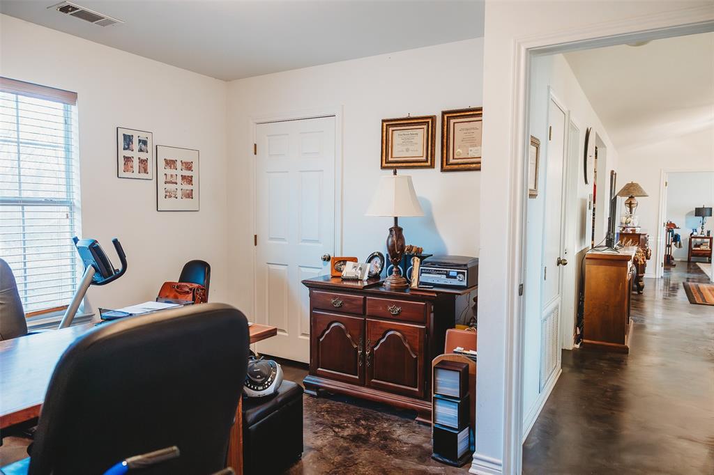 6078 East Line Road Whitewright, TX 75491 - Photo 23 of 32 Office space featuring concrete flooring and baseboards