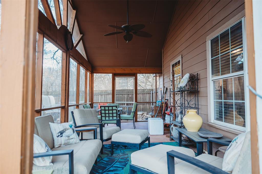 6078 East Line Road Whitewright, TX 75491 - Photo 29 of 32 Sunroom featuring ceiling fan, an outdoor living space, and lofted ceiling