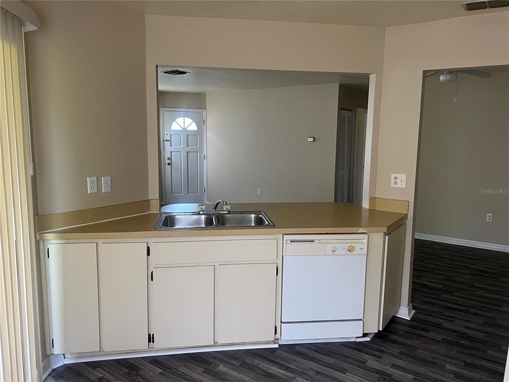 7266 Pond Circle Spring Hill, FL 34606 - Photo 6 of 11 a bathroom with a sink and a mirror