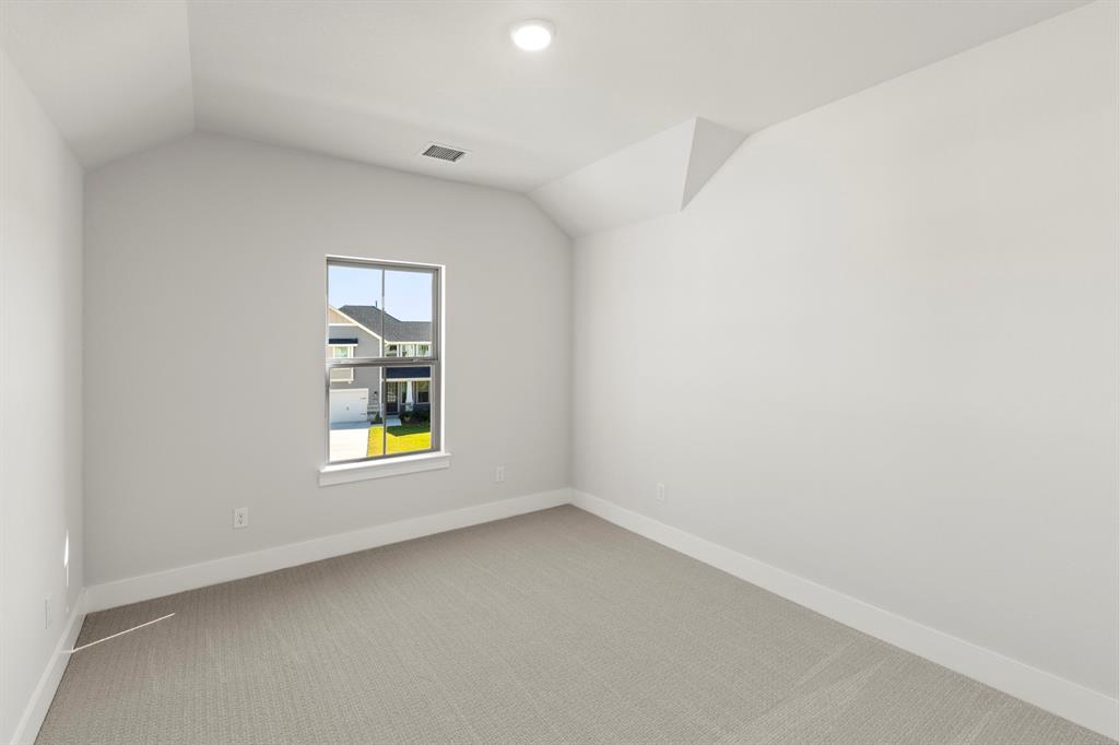 2917 Andesite Road McKinney, TX 75071 - Photo 23 of 27 an empty room with window