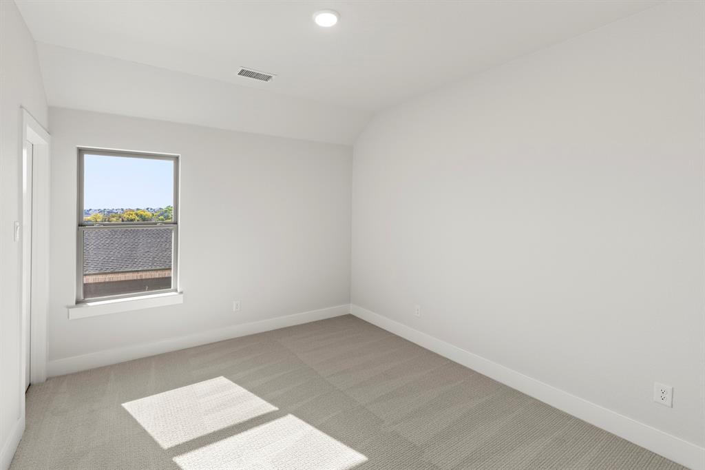 2917 Andesite Road McKinney, TX 75071 - Photo 24 of 27 an empty room with a window