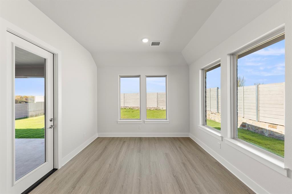 2917 Andesite Road McKinney, TX 75071 - Photo 9 of 27 a view of an empty room with a window
