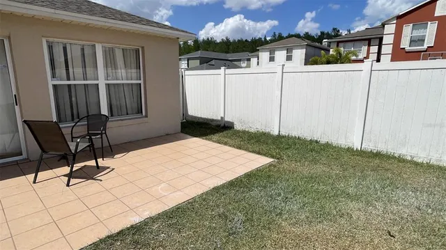 a view of a terrace with chairs