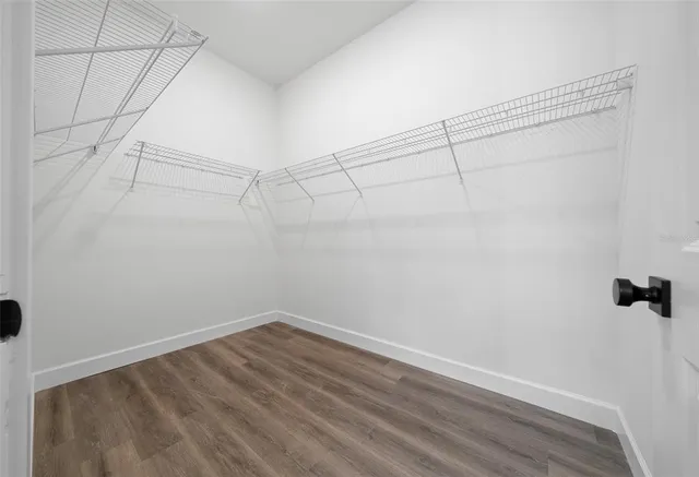 a view of a room with racks on the wall