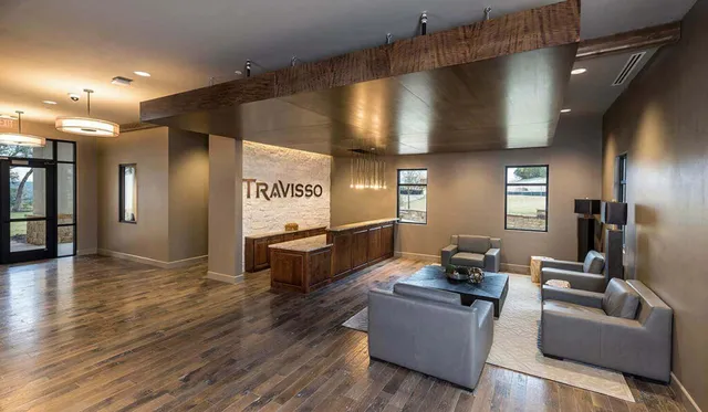 a view of a living room with furniture