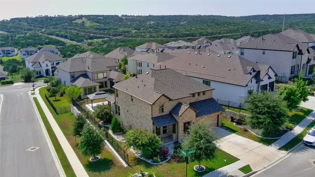 an aerial view of a house with a garden