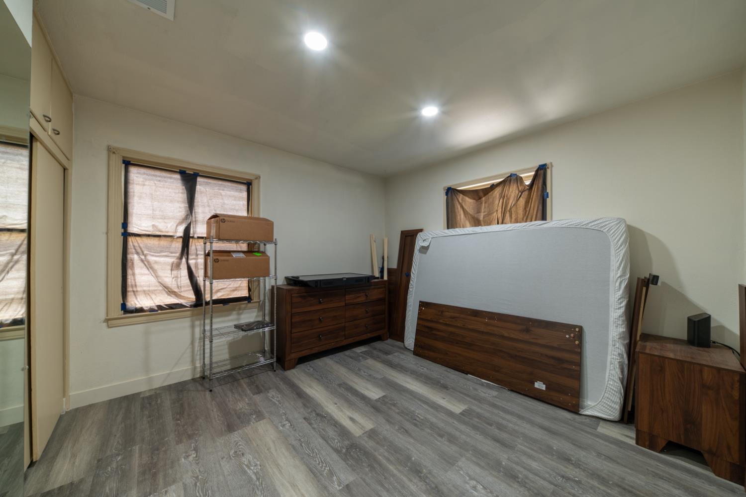 1004 West Pontiac Way Fresno, CA 93705 - Photo 17 of 34 a bedroom with furniture and window