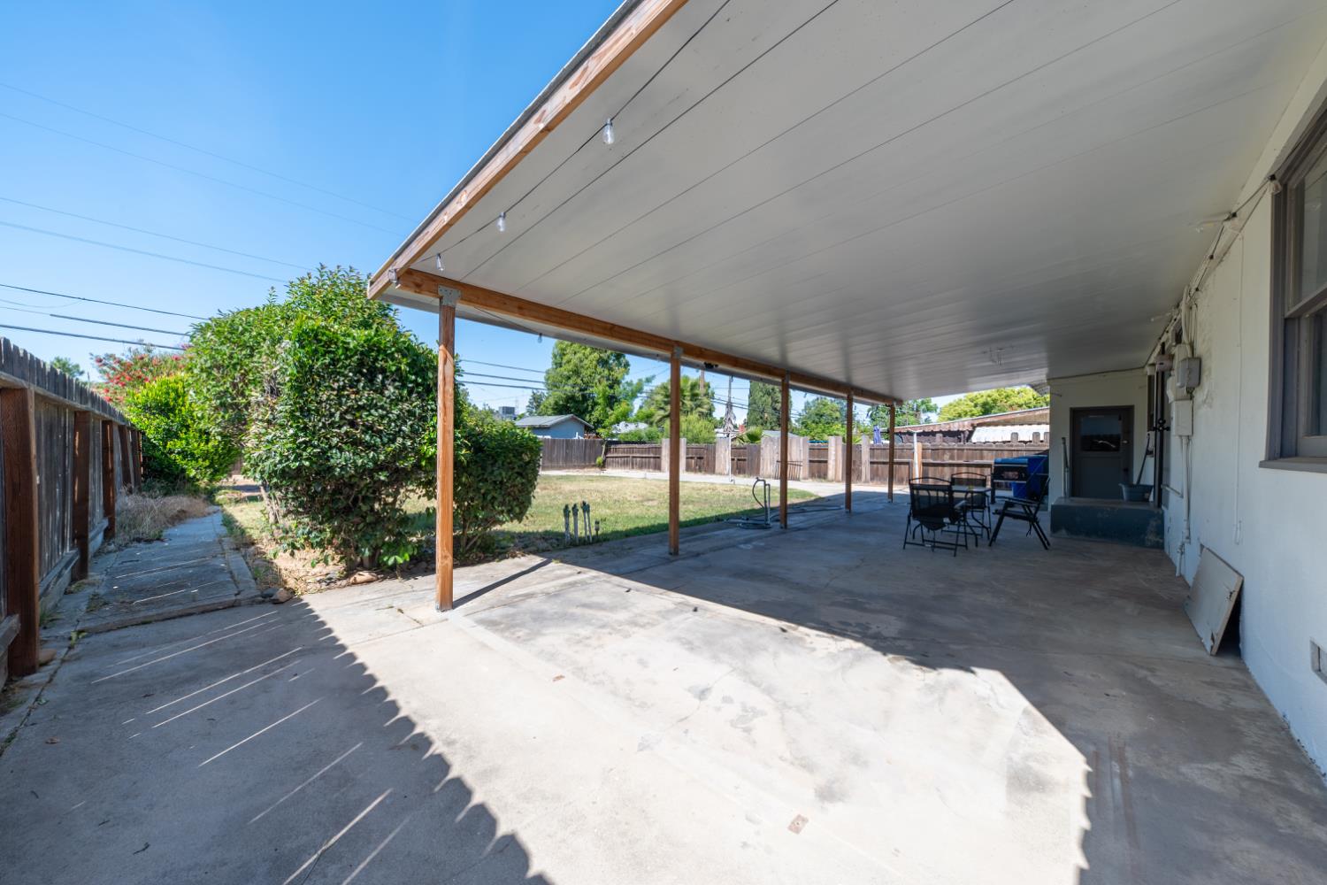 1004 West Pontiac Way Fresno, CA 93705 - Photo 26 of 34 a view of a backyard with sitting area